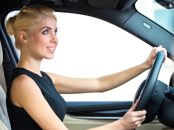 Woman Driving a Car