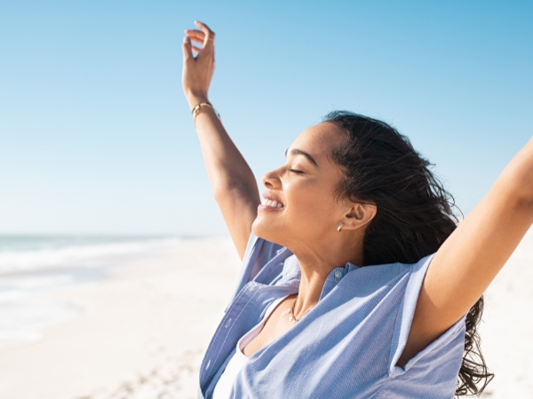 Happy Woman on a Beach