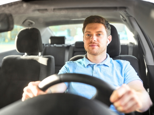 Man Driving a Car