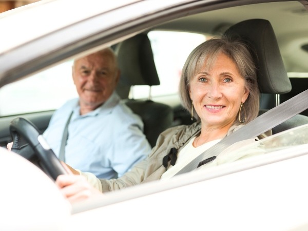Elderly Couple in a Car