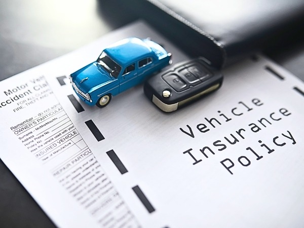 Mini Blue Car and Insurance Policy