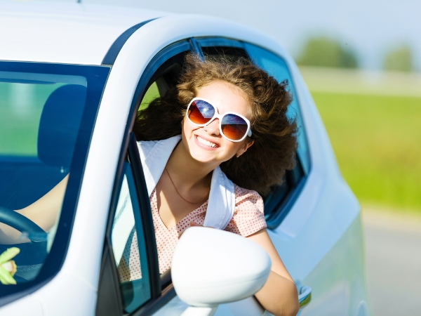 Woman Driving a Car